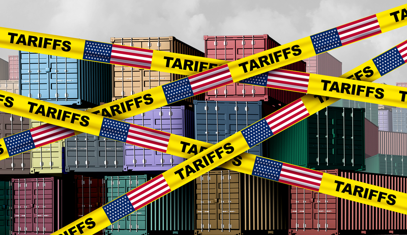 Tariffs on containers with caution tape